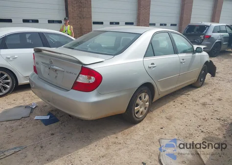 2003 Toyota Camry Le from USA, damaged, VIN 4T1BE32KX3U144402